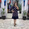 Palerine | Vestido de lunares con plisados